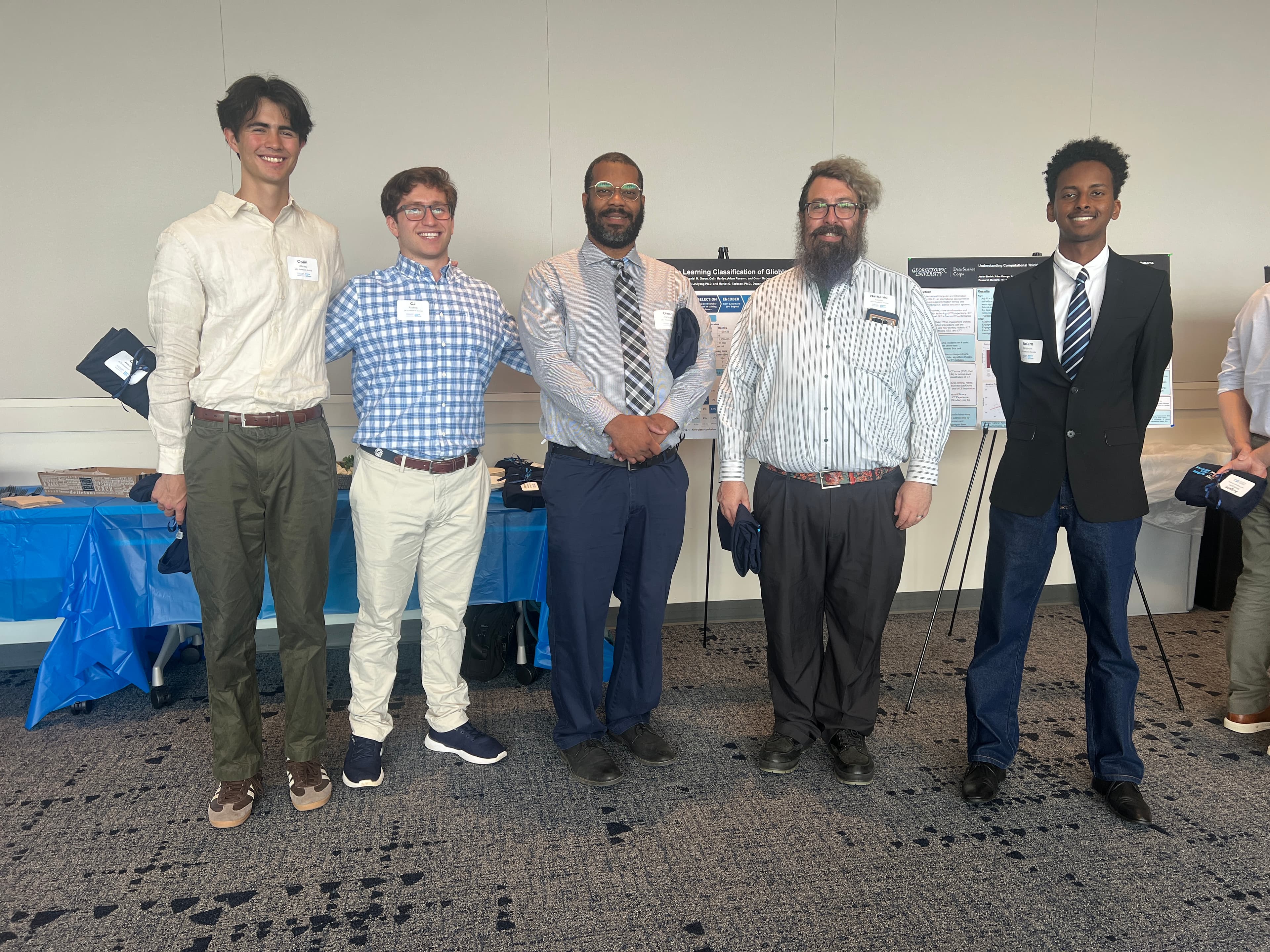 Adam with Georgetown Data Science Corps team members at the MDI Summit